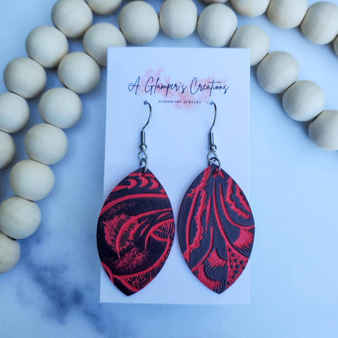 Red &amp; Black Western Floral Embossed Petal Leather Earrings are made of high-quality genuine leather.