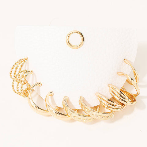 This set of 5 pairs of gold color earrings timeless