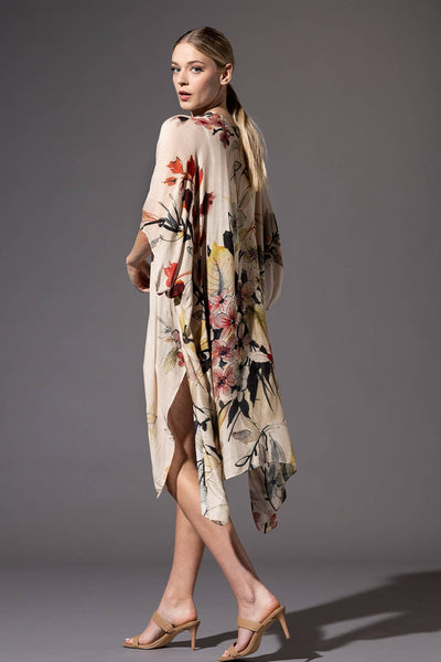 off white base color with magnificent florals throughout.  Light weight and flowy kimono