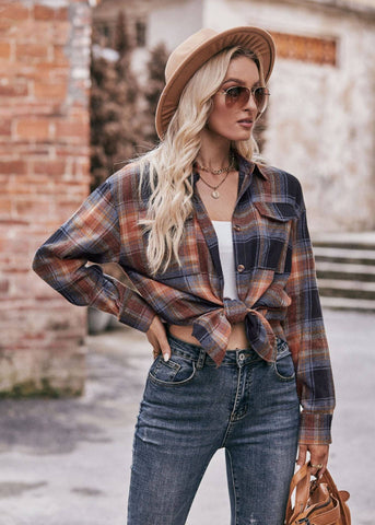 oversized plaid flannel shirt in colors of autumn.  The shirt can be tied at the waist.
