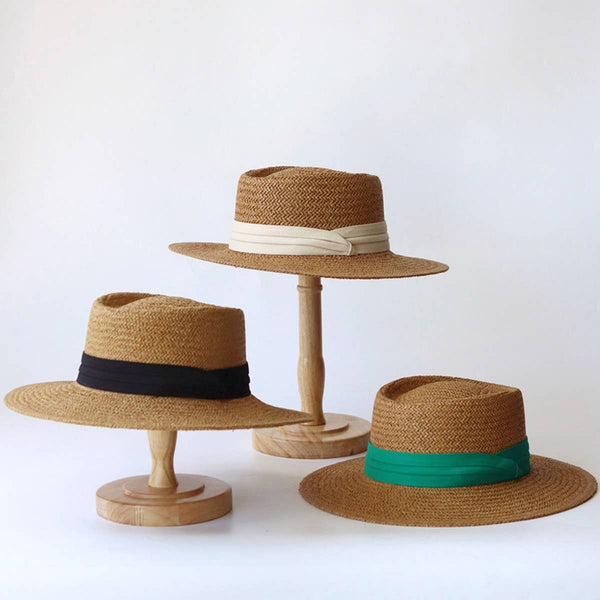 seasonal woven hat with a striking fabric band for shading in the sunnier months.