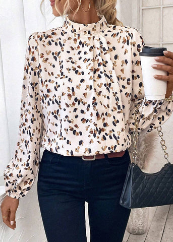 Long sleeved lantern style leopard print white blouse has a mock T neck