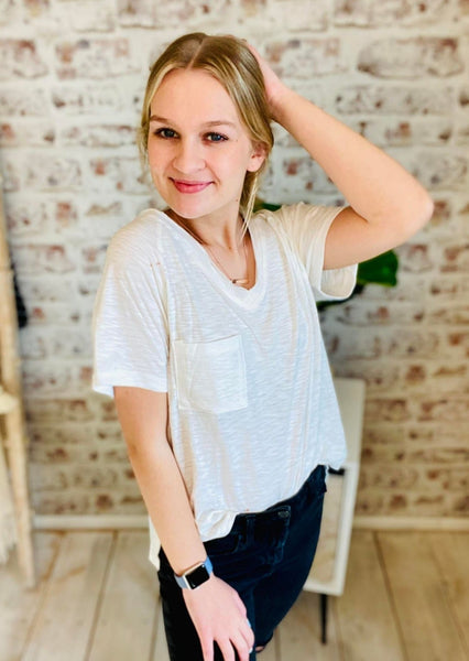 Woman wearing Basic V-Neck White Tee with a pocket 