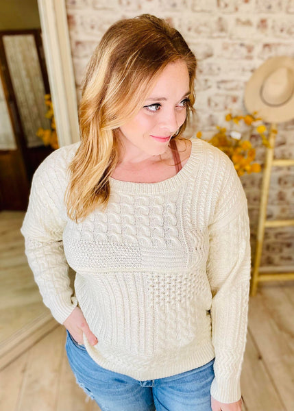 Woman wearing Cream Knit Sweater with a tie in the back