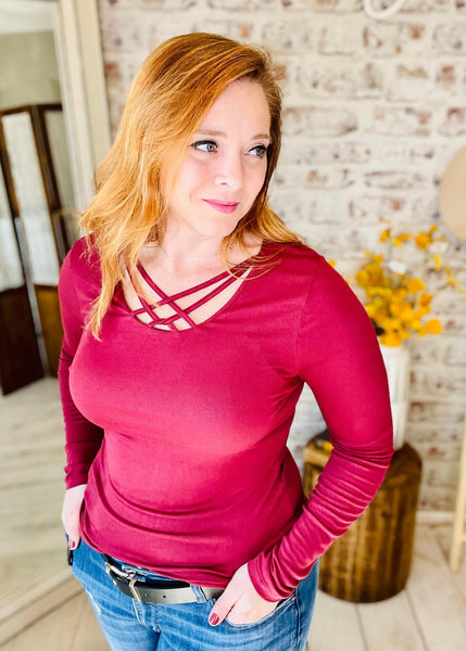 Woman wearing Burgundy Strappy Neck Top 