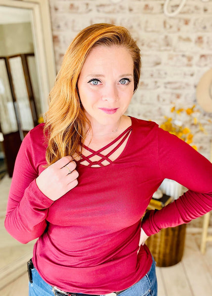 Woman wearing Burgundy Strappy Neck Top 